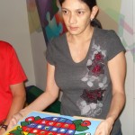 Director Carla shows a therapy puzzle that is very expensive to purchase in Mexico.