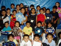 Children receiving school supplies